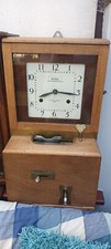 vintage clocking in machine