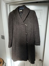 Ladies coat by Kaliko. Size 12. Knee length. Boucle. Toggle fastening. Rear vent