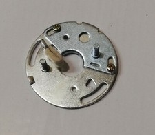 Ignition base plate breaker