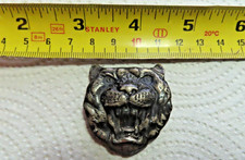 Growling cat head  figure from