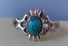 Traditional Navajo turquoise sand cast cuff, total size  6"  signed F.L Begay