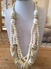 Brand new multi strand necklace with huge chunky cream wooden beads