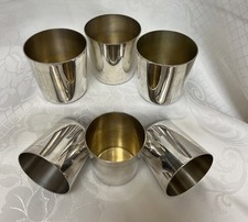 Six Vintage Silver plate stirrup cups with gilt lining in a leather case.