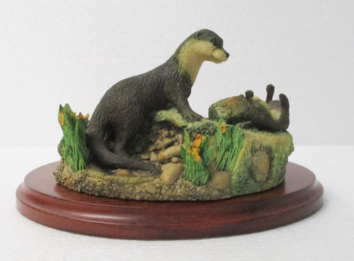 Border fine arts otter family - fine,