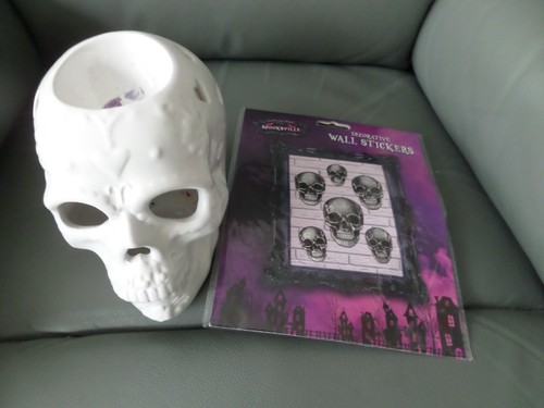 Skull shaped ceramic candle