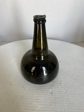 Vintage style Green Thick Glass Onion Bottle. Size 7 1/2 tall 5 1/2 diameter.