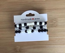 Cream rose and bow bracelets - and,