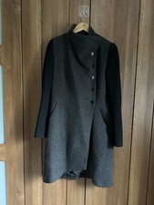 Bastyan wool-blend coat with sleek black sleeves and an asymmetric button front