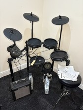 Alesis Nitro Mesh Electronic Drum Kit with amplifier, stool, manual, keys sticks