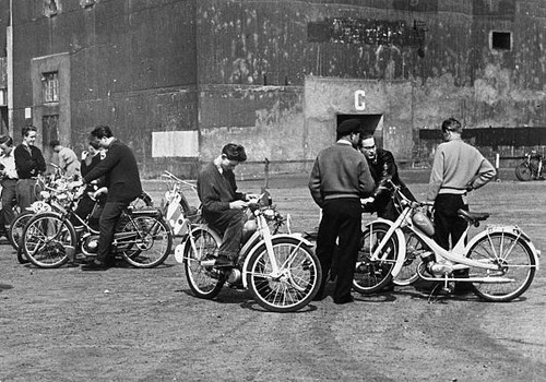 Young people with their mopeds