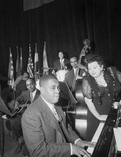 Mildred Bailey Stands Beside