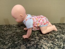 Giggles & Wiggles Crawling Baby Doll - CRAWLS, WRIGGLES, TALKS, SINGS & GIGGLES