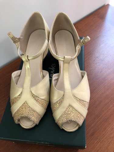 Ladies gold low heeled