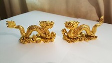 Two Gold coloured small Resin