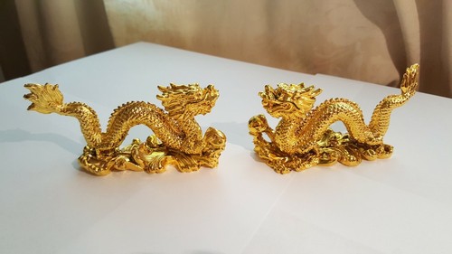 Two gold coloured - two,