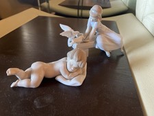 Lladró NAO Girl Feeding Doves