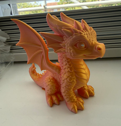 Orange pink dragon figurine - dragon,