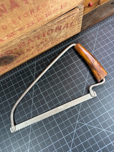 Vintage meat bone saw - bone, marbled
