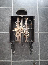 ANTIQUE WEIGHT DRIVEN COMTOISE MOVEMENT AND HANGING BRACKET