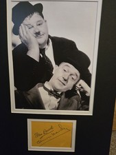 Laurel and Hardy Autographs. Together on same Page 