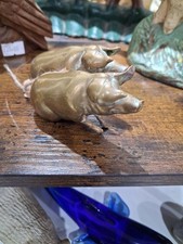 A Pair Of Brass Pigs.