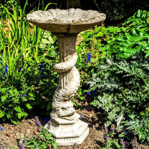 Tall stone cast garden bird - stone,