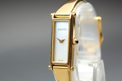 Exc gucci 1500l - gucci, gold