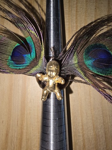 Golden baby and peacock - and,