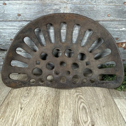 Cast iron tractor seat - cast,