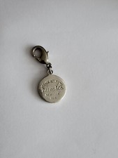 Please Return To Tiffany & Co