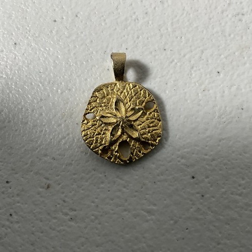 Gold tone sand - tone, dollar