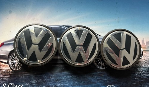 Three volkswagen wheel center - three,