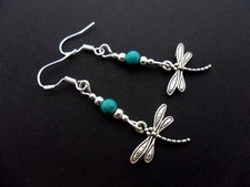 A PAIR OF TIBETAN SILVER