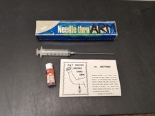 NEEDLE THRU ARM - Bill White
