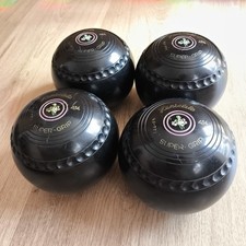 Set of four Henselite Super Grip Lawn Bowls size 4 3/4 