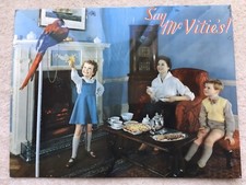 C1950s VINTAGE SAY Mc VITIE’S! CHILDREN AND PET PARROT ADVERTISING TIN SIGN