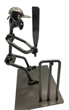 Metalwork Cricket Figure Nuts