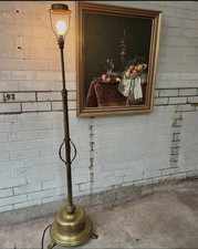 A lovely quality & heavy brass standing lamp. Three paw/claw feet.