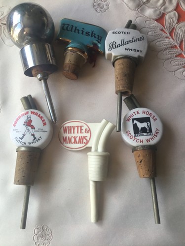 Whiskey bottle toppers and - bottle,