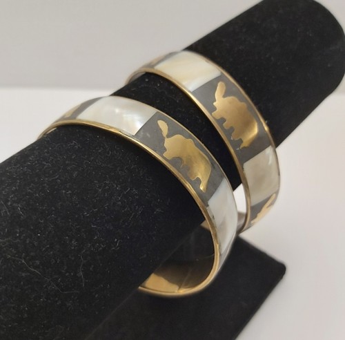 Gold tone elephant bangle - elephant,