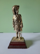 A BRASS FIGURINE OF A BLACK WATCH SOLDIER IN REGIMENTAL DRESS: 4.5" TALL: VGC