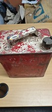 old garage oil cans