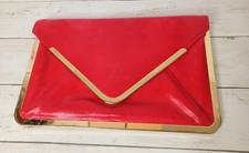 Ladies red and gold clutch