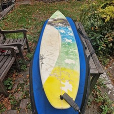 SPIDER/SAFARI- EGG- 7 FT 6 INCH SURFBOARD WITH LEASH AND SECOND SKIN BOARD BAG.