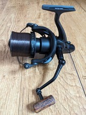 Sonik Dominator X  8000 Reel PLUS Sonik Padded Reel Protector.