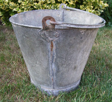 Vintage galvanised metal bucket planter or logs
