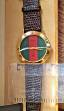 GUCCI 3000M mens fine Swiss watch, green and red in mint condition.