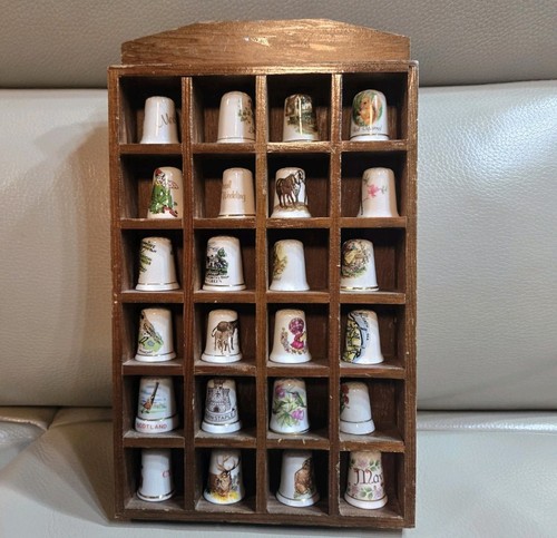 Thimble display case with - thimble,