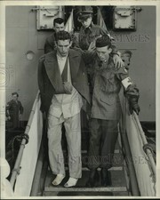 Press Photo Corp. Charles Gittings Helped By Richard Hanahan Down The Gangplank