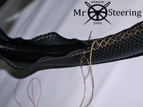 Perforated leather steering - leather,